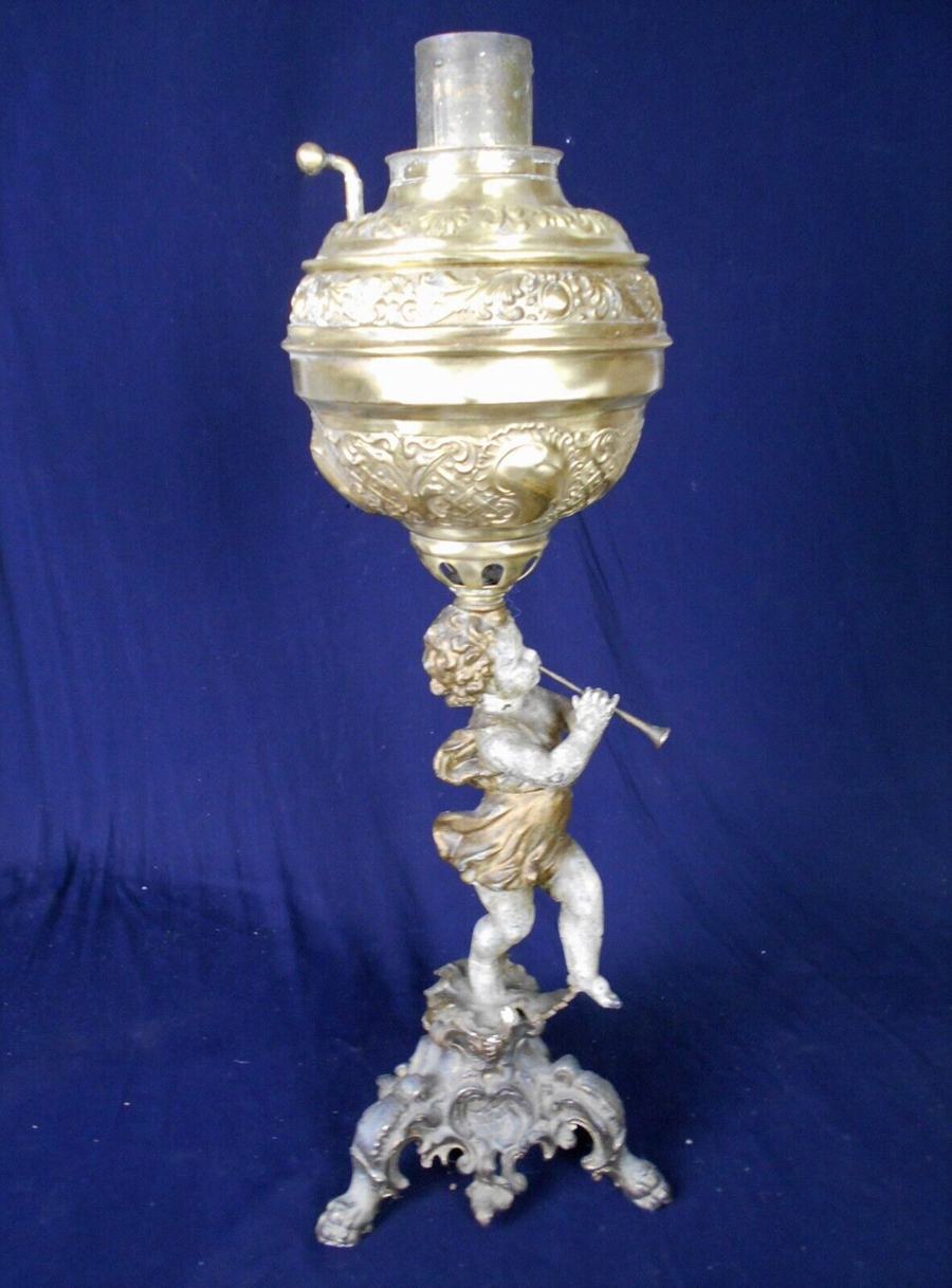 ANTIQUE VICTORIAN FIGURAL OIL LAMP WITH FLUTE PLAYING CHERUB