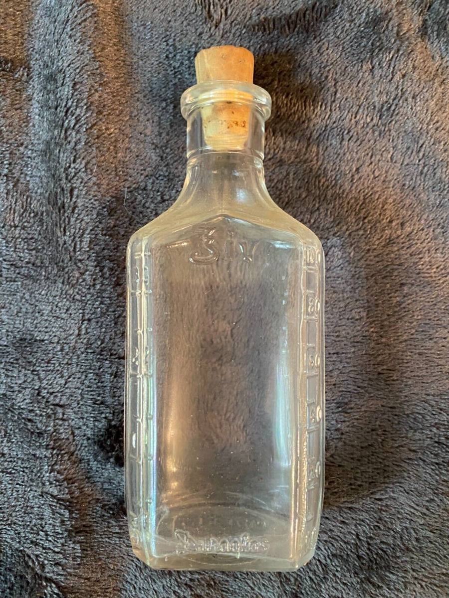 Vintage Prescription bottle with volume markings and cork